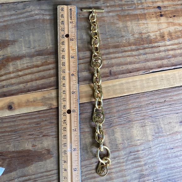 Michael Kors Goldtone Link Toggle Logo Branding Bracelet - Picture 15 of 16